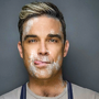 Robbie Williams a jeho The Edge